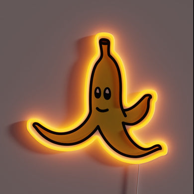 Smiling banana cartoon neon sign.