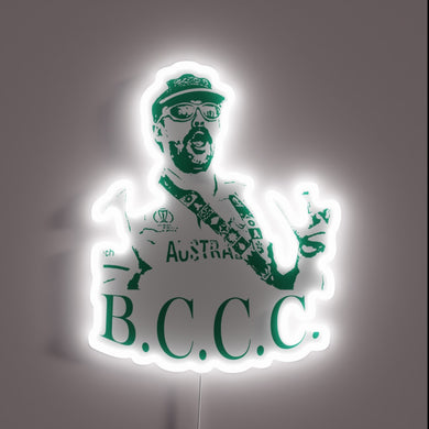 Vibrant green and red LED glow of a tree logo.