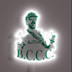 Vibrant green and red LED glow of a tree logo.