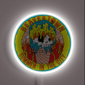 Eye-catching RGB neon sign illuminating Beavertown's 'Summer in the City' branding.