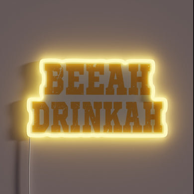 Electrically illuminated 'Beer Drinker Beeah Drinkah' RGB neon bar decoration.