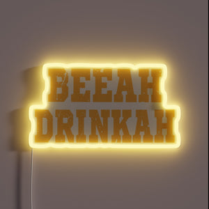 Electrically illuminated 'Beer Drinker Beeah Drinkah' RGB neon bar decoration.