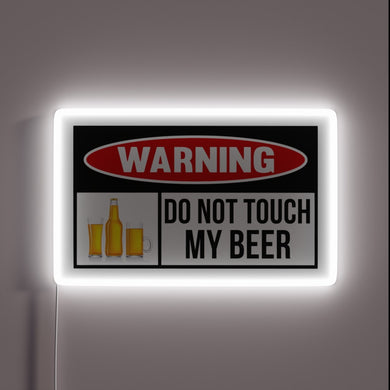 Brew responsibly: beer warning message illuminated in bright neon lights
