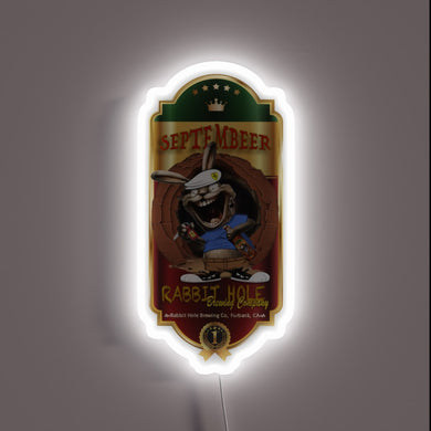 Glowing RGB Neon Sign in Shimmering Colors Featuring Beerton's Design.