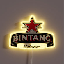 Load image into Gallery viewer, Indoor bar decoration featuring multicolor neon Bintang beer logo.