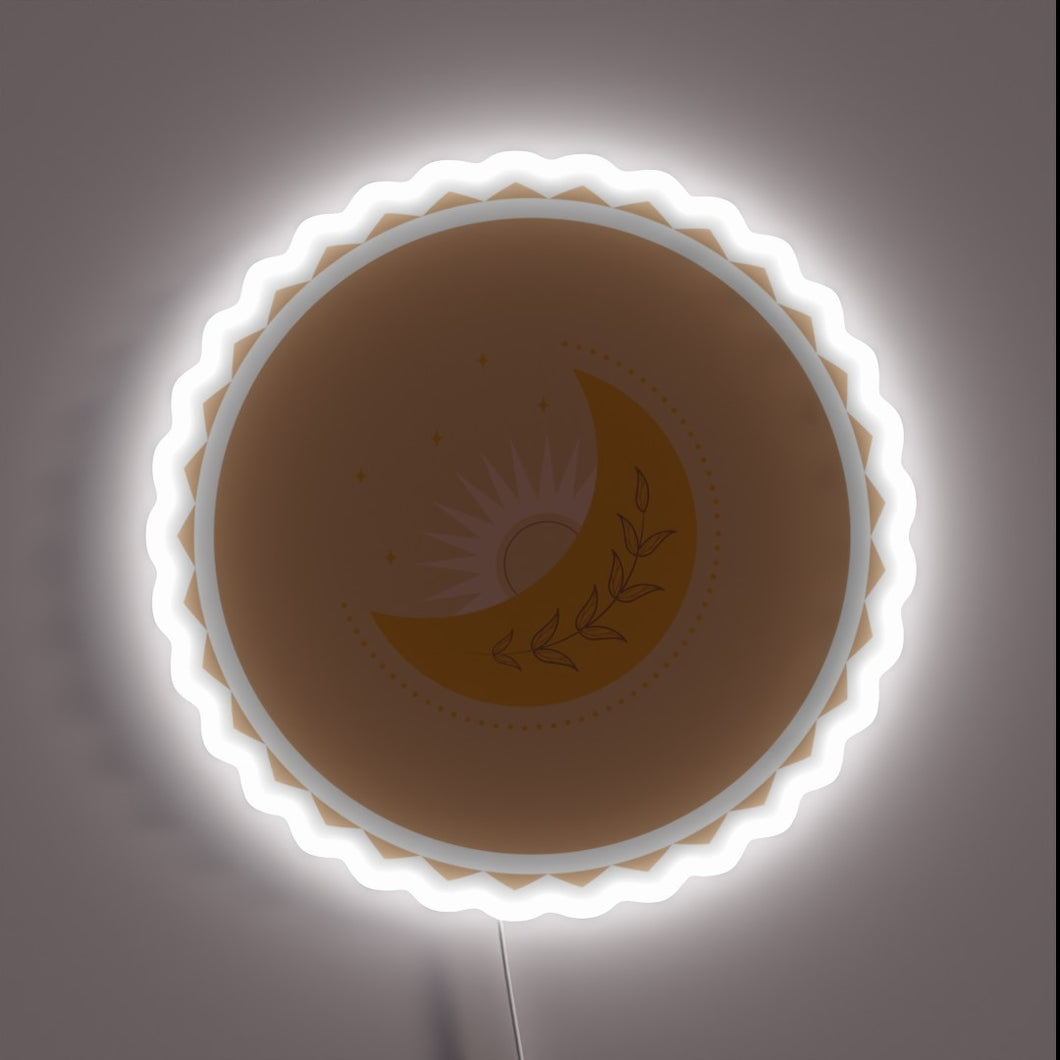 Boho-style moon and sun neon sign with leaf accents.