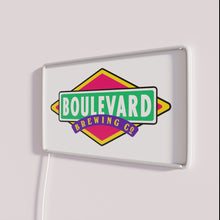 Load image into Gallery viewer, Boulevard logo illuminated in vibrant RGB color changing neon lighting