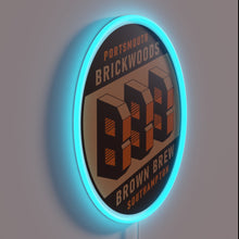 Load image into Gallery viewer, Neon bar decor with vibrant brown and blue beer lights.