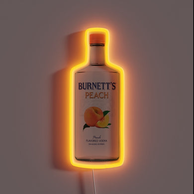 Neon sign shaped like a Burnett's Peach vodka bottle with an orange glow.
