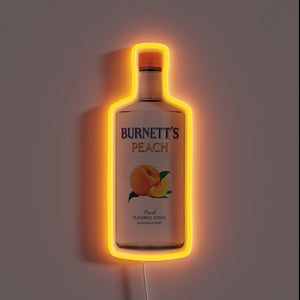 Neon sign shaped like a Burnett's Peach vodka bottle with an orange glow.
