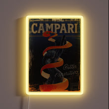 Load image into Gallery viewer, Vintage Campari neon sign with orange peel and classic artwork.