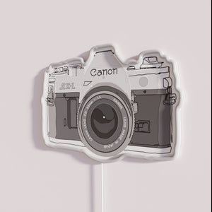 Neon Photography Sign for Cameras Illustrating Creativity and Artistic Passion