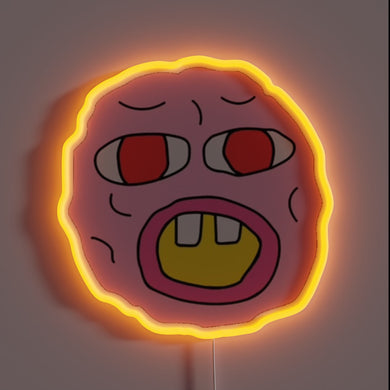 Neon sign of the Cherry Bomb logo with wild cartoon face and bold lines.