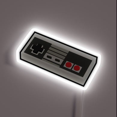 Retro NES controller neon sign with white glow.