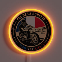 Load image into Gallery viewer, This neon design is a bold tribute to **Col de la Bonette**, one of the highest paved roads in the Alps. The vintage-style motorcycle and French flag colors give it a rugged, adventurous feel—perfect for bikers and road-trip lovers.