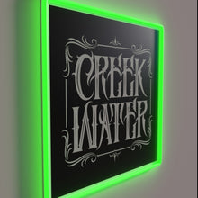 Load image into Gallery viewer, Glowing creek water whiskey logo in vibrant RGB neon colors