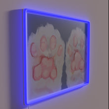 Load image into Gallery viewer, Vibrant Neon Sign Features Semi-Realistic Colorful Kitten Paw Prints Design.