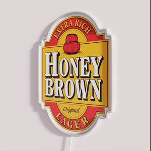 Neon bar decor featuring colorful Dave's Honey Brown Lager beer sign