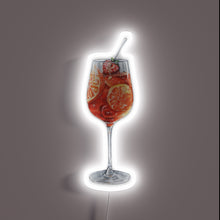 Load image into Gallery viewer, Bright citrusy aperol spritz cocktail garnished with colorful fruit slices