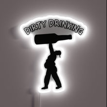 Load image into Gallery viewer, Gaudy neon sign with &#39;Dirty Drinking&#39; in bold, colorful letters
