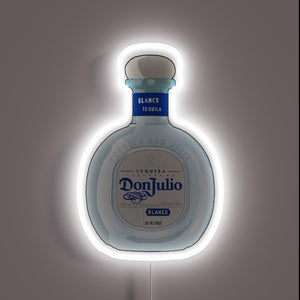 **Alt text:** *Don Julio tequila bottle neon sign with white glow.*