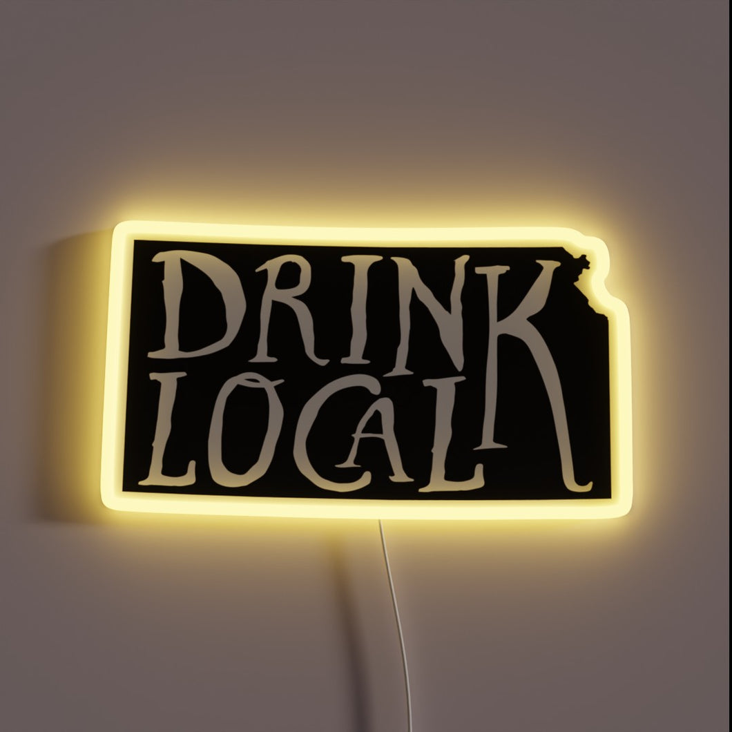 Backlit outline of Kansas map highlights local craft beer culture.