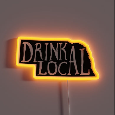 Neon beer sign featuring state outline with vibrant color accents.