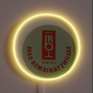 Vibrant East German-inspired beer coasters with neon beer signs decor.