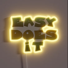 Load image into Gallery viewer, Relaxing Easy Does It inspirational quote in colorful neon lighting
