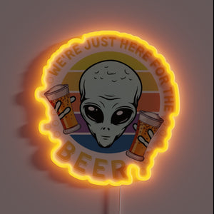 Retro space humor neon sign: beer-loving alien extraterrestrial gathering spot
