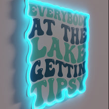 Load image into Gallery viewer, Fun lake vibes with a cheeky &#39;Gettin&#39; Tipsy&#39; neon sign