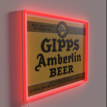Load image into Gallery viewer, Vibrant neon decoration featuring beer bottle and GIPPS Amberlin branding