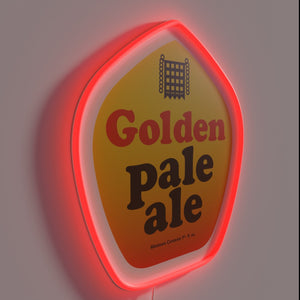 Neon bar decoration with vibrant golden ale signage illuminated glow.