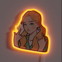 Load image into Gallery viewer, Alt text: &quot;Neon sign of a cartoon-style girl with long blonde hair making a double rock hand gesture, glowing with orange light.&quot;

