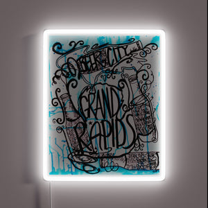 Eye-catching Grand Rapids cityscape illuminated with vibrant RGB neon lights.