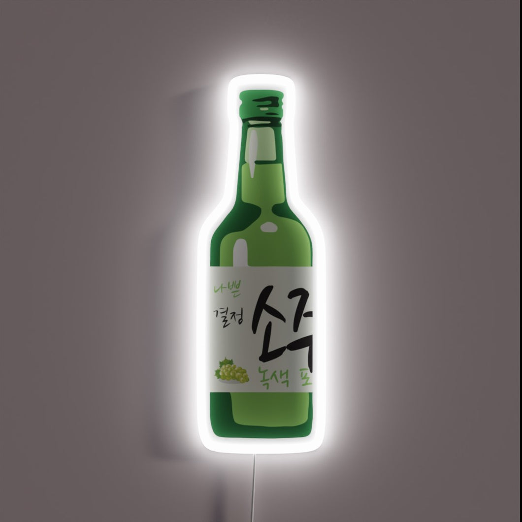 Green grape soju bottle neon sign with Korean text and white glow.
