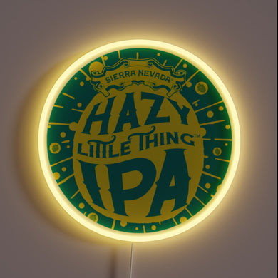 Customneon sign featuring the Hazy Little Thing IPA logo from Sierra Nevada Brewing, with vibrant yellow and green colors surrounded by a glowing yellow neon ring