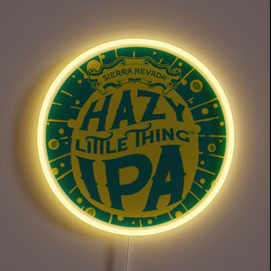 Customneon sign featuring the Hazy Little Thing IPA logo from Sierra Nevada Brewing, with vibrant yellow and green colors surrounded by a glowing yellow neon ring