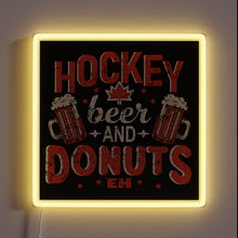 Load image into Gallery viewer, Vibrant neon lightbox featuring hockey-themed beer donut Canadian pride graphics