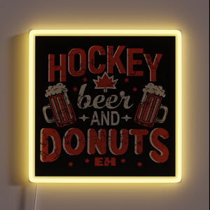 Vibrant neon lightbox featuring hockey-themed beer donut Canadian pride graphics