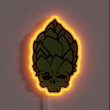 Load image into Gallery viewer, hop-head-customneon-70840 – Neon wall sign shaped like a hop cone with a skull face, outlined in glowing orange light