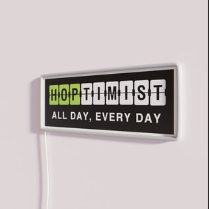 Add vibrant optimism to your space with HOPTIMIST neon lighting.