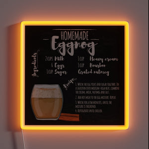 Cozy winter wonderland kitchen decor featuring eggnog recipe in neon.