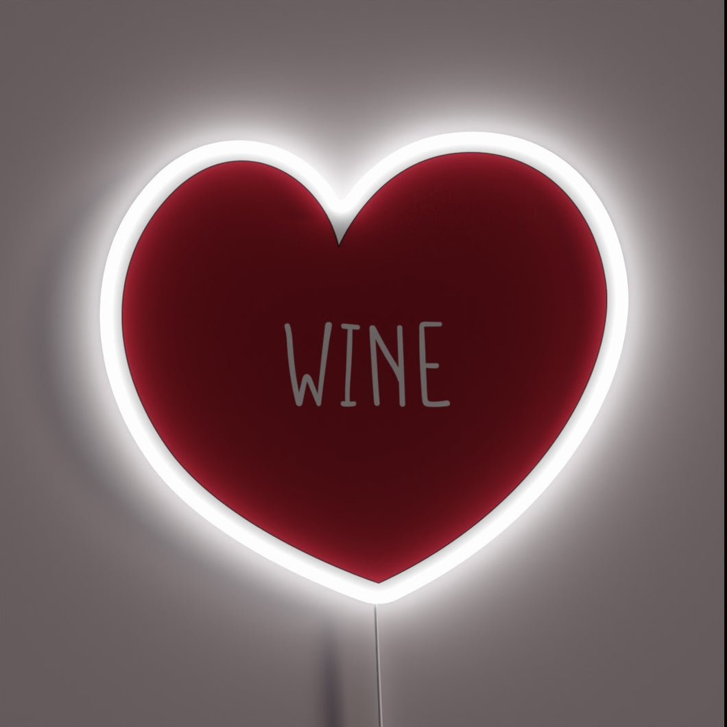Vibrant neon bar decor with wine lover's heart sentiment