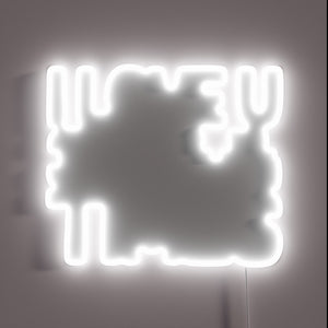 Neon sign declaring playful love in bright RGB colors.