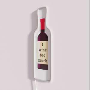 Eye-catching neon bar decor featuring 'I Wine Too Much' script