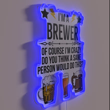 Load image into Gallery viewer, Colorful neon sign declaring pride in beer brewing eccentricity humorously.