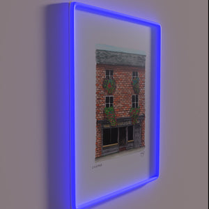 Traditional Irish pub decor with colorful Cagneys neon LED lighting.