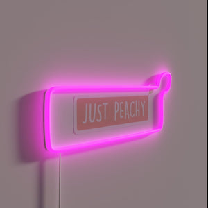 Add a touch of whimsy with this peach-colored neon sign.