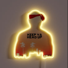 Load image into Gallery viewer, Neon silhouette with red headband and &quot;KEEP YA HEAD UP&quot; text over sunset cityscape.
